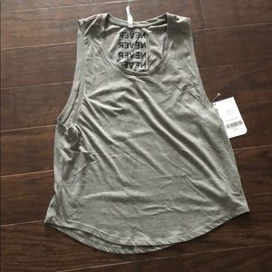 Fabletics Tops - BRAND NEW!! Never settle tank Fabletics Tops - BRAND NEW!! Never settle tank